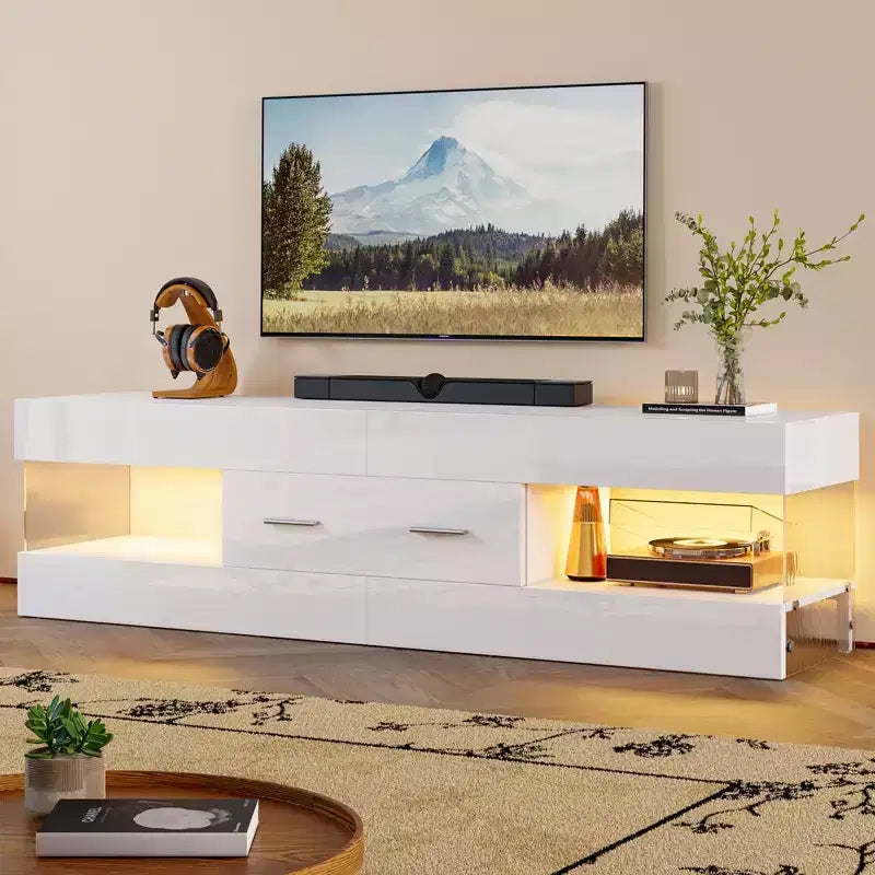 Meuble TV Bestier noir ultra-brillant pour TV jusqu'à 65 pouces, meuble de divertissement LED moderne avec tiroirs de rangement
