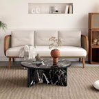 Table basse ronde noire en MDF polyvalente pour différents styles d'intérieur, alliant minimalisme moderne et charme nordique