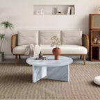 Table basse ronde noire en MDF polyvalente pour différents styles d'intérieur, alliant minimalisme moderne et charme nordique