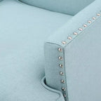 Fauteuil club contemporain GDFStudio Richardson en tissu rembourré avec clous décoratifs