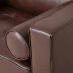 Fauteuil club capitonné contemporain en similicuir GDFStudio Hixon avec traversins