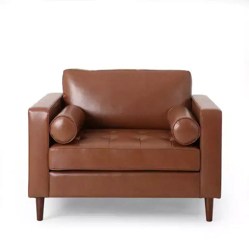 Fauteuil club capitonné contemporain en similicuir GDFStudio Hixon avec traversins