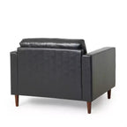 Fauteuil club capitonné contemporain en similicuir GDFStudio Hixon avec traversins