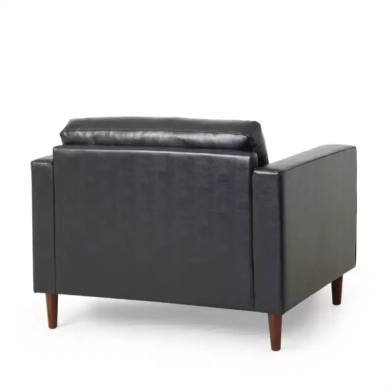 Fauteuil club capitonné contemporain en similicuir GDFStudio Hixon avec traversins