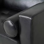 Fauteuil club capitonné contemporain en similicuir GDFStudio Hixon avec traversins