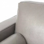 Fauteuil club capitonné contemporain en similicuir GDFStudio Hixon avec traversins