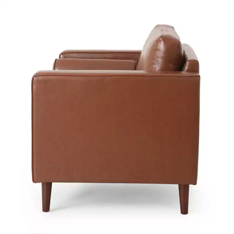 Fauteuil club capitonné contemporain en similicuir GDFStudio Hixon avec traversins