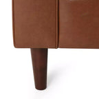 Fauteuil club capitonné contemporain en similicuir GDFStudio Hixon avec traversins