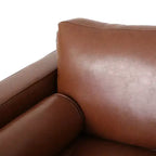 Fauteuil club capitonné contemporain en similicuir GDFStudio Hixon avec traversins