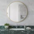 Miroir de vanité de salle de bain HomeRoots 20 encadré en métal doré et rond