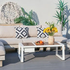 Salon de jardin moderne avec table basse et seau à glace