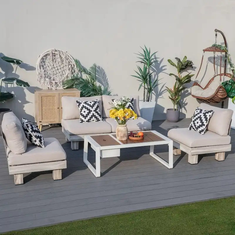 Salon de jardin moderne avec table basse et seau à glace