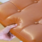 Chaise de salle à manger moderne en similicuir marron avec dossier tissé et piètement cantilever