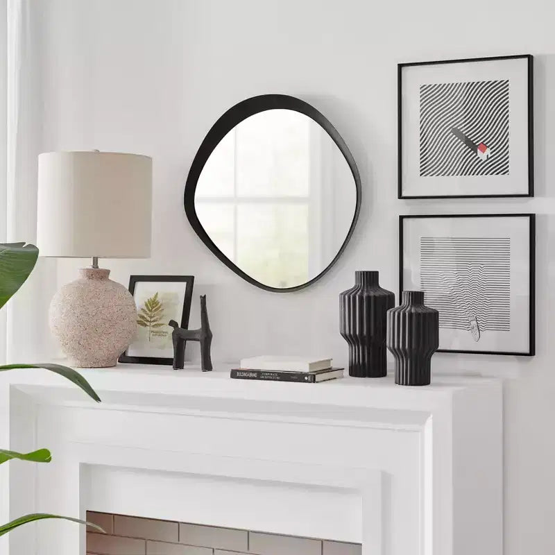 Miroir mural rond asymétrique contemporain Sonya de 61 cm avec cadre en fer noir en relief