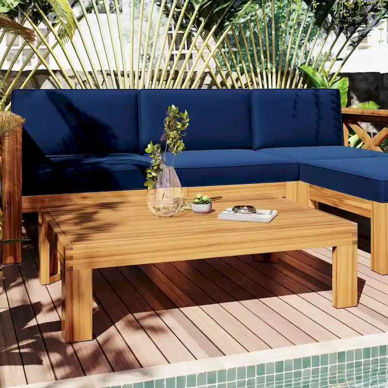 Canapé d'angle d'extérieur en bois avec coussins