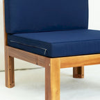 Canapé d'angle d'extérieur en bois avec coussins