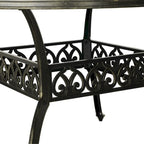 59 Table ronde élégante en aluminium coulé ajouré - Bronze