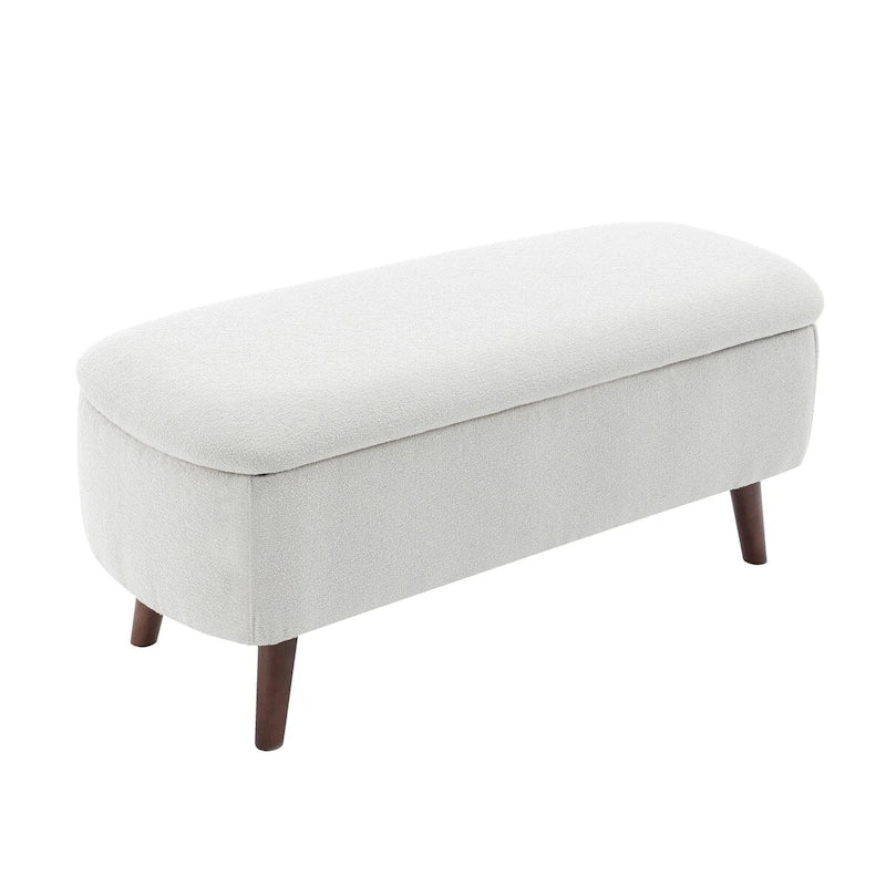 Banc de rangement Celia en tissu bouclé avec pieds en bois d'hévéa