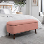 Banc de rangement Celia en tissu bouclé avec pieds en bois d'hévéa