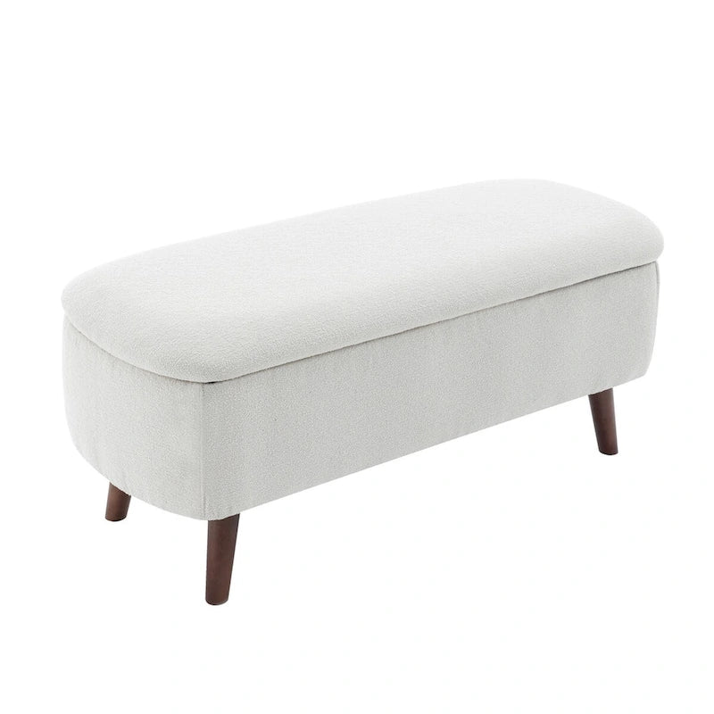 Banc de rangement Celia en tissu bouclé avec pieds en bois d'hévéa