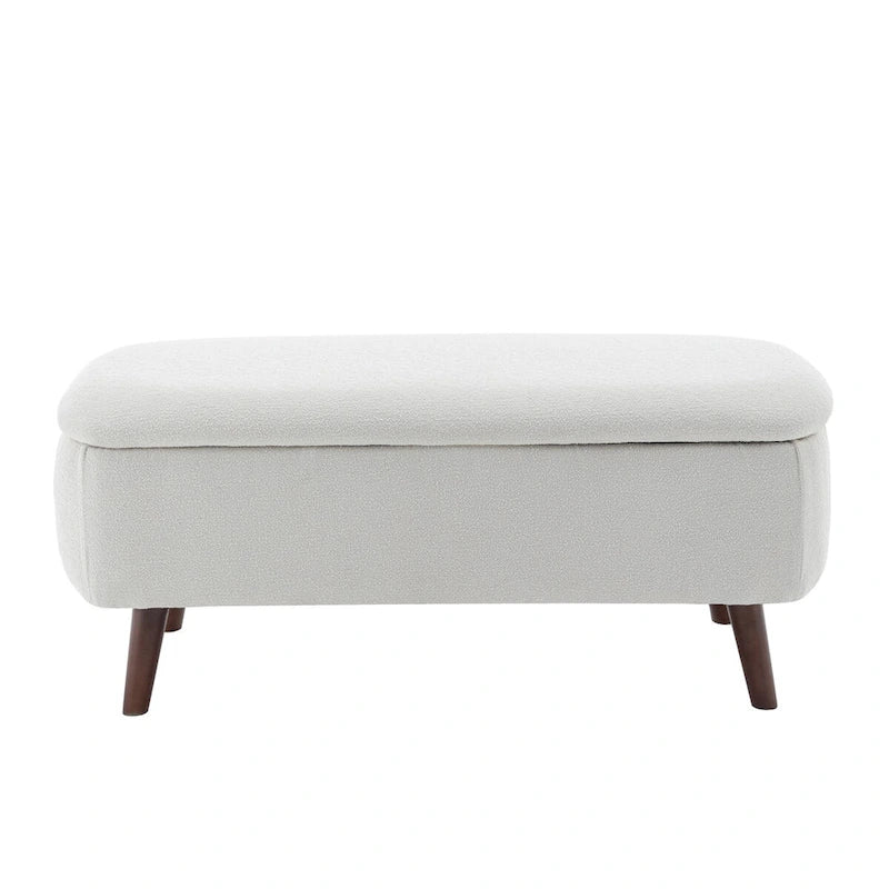 Banc de rangement Celia en tissu bouclé avec pieds en bois d'hévéa
