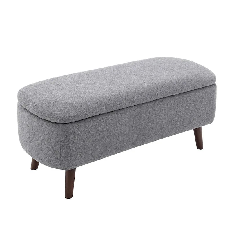 Banc de rangement Celia en tissu bouclé avec pieds en bois d'hévéa