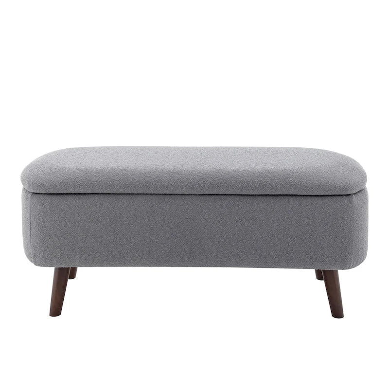 Banc de rangement Celia en tissu bouclé avec pieds en bois d'hévéa