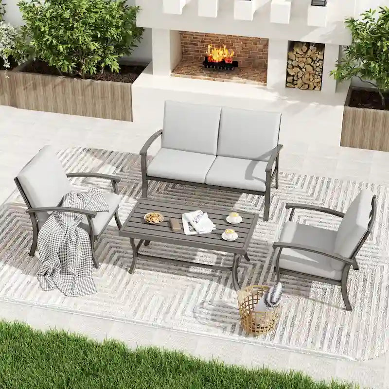 Ensemble de conversation en aluminium 4 places pour patio avec table basse, causeuse et coussins gris clair